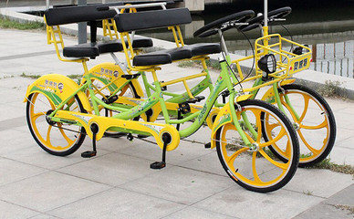 奥威特多人联排自行车 一体轮设计、雨篷配置，打造舒适多人骑行体验